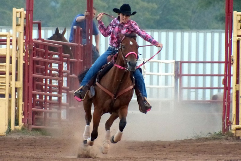 Cowgirl Barrel Racing Image